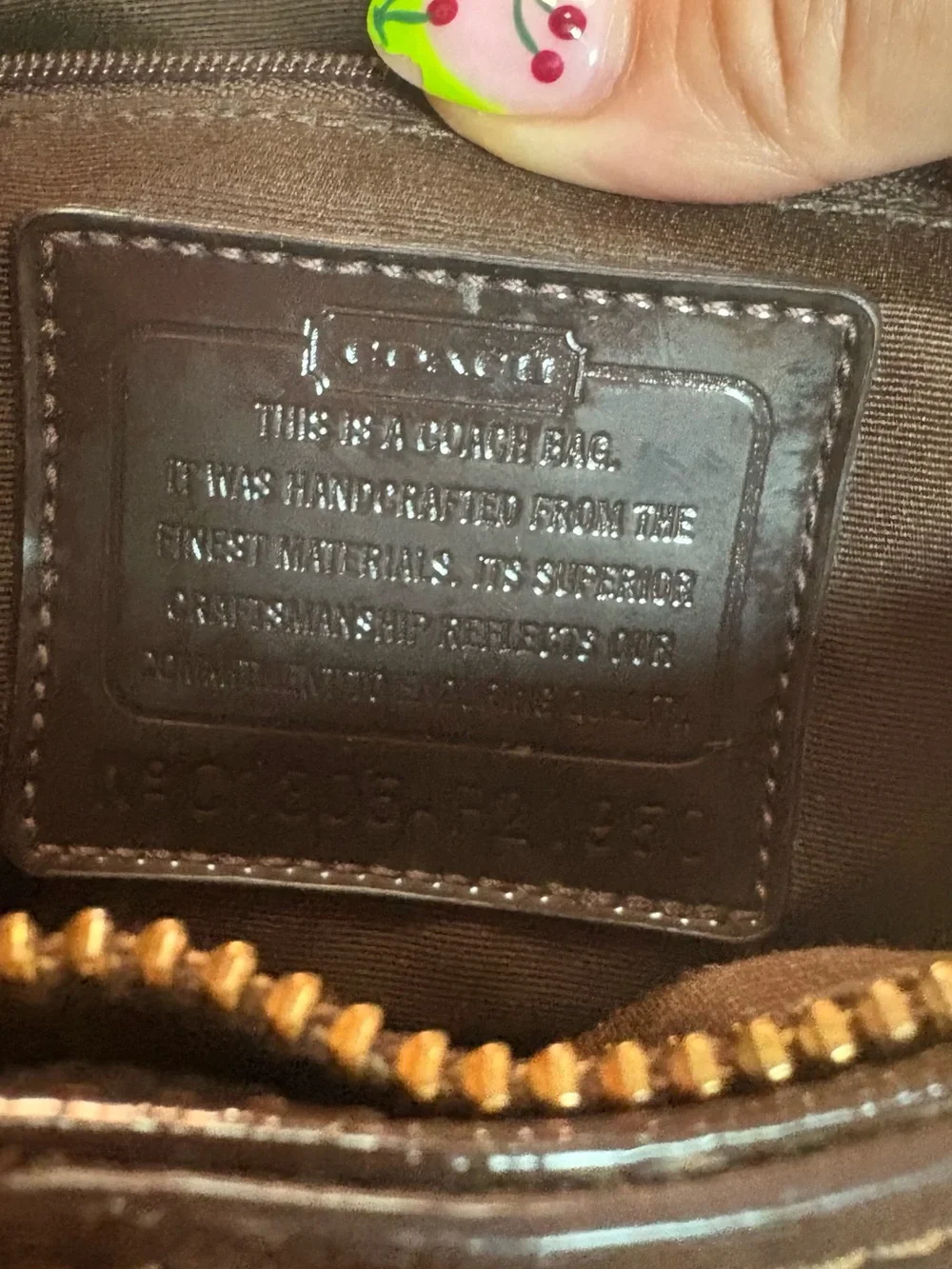 Coach brown signature